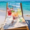 Ręcznik plażowy XXL 100x180 z realistyczną grafiką rozłożony na leżaku przy basenie
