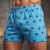 Niebieskie bokserki męskie wzorzyste 100% bawełna na modelu Cotton World