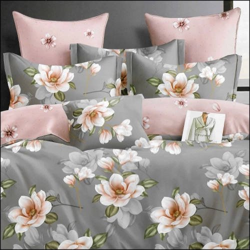 Szaro-różowa pościel flanelowa w duże kwiaty magnolii na łóżku