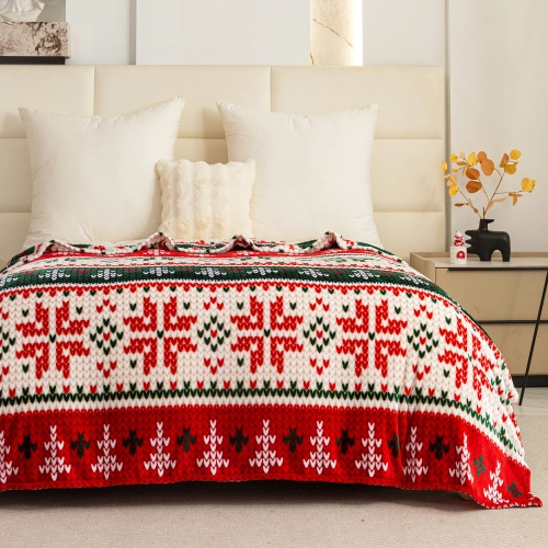 Koc świąteczny 200x220 cm mikrofibra na łóżku