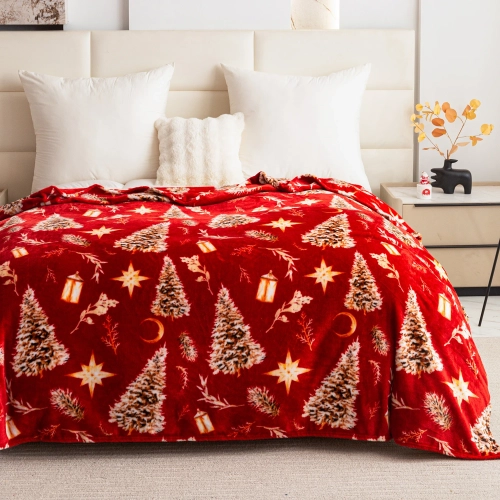 Koc świąteczny 200x220 cm mikrofibra na łóżku