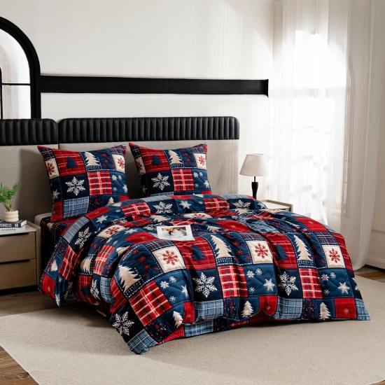 Świąteczna pościel patchwork z choinkami i płatkami śniegu ujęcie z przodu sypialni