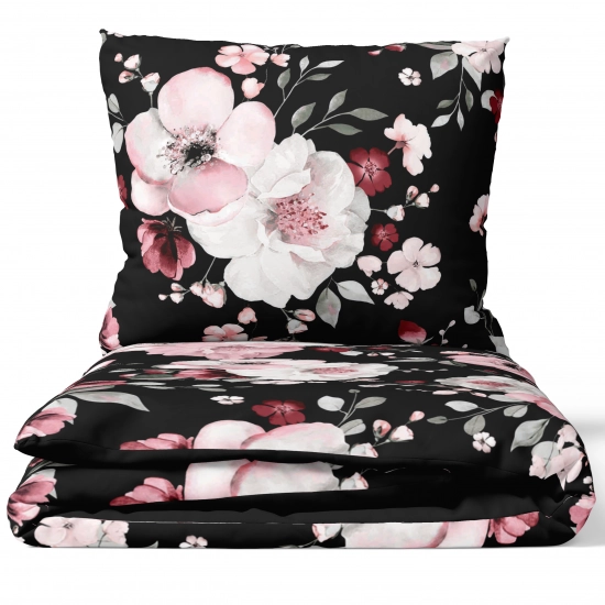 Złożony komplet pościeli bawełnianej J&W Nocny Ogród na białym tle, widoczny gęsty, malarski wzór kontrastowych kwiatów.