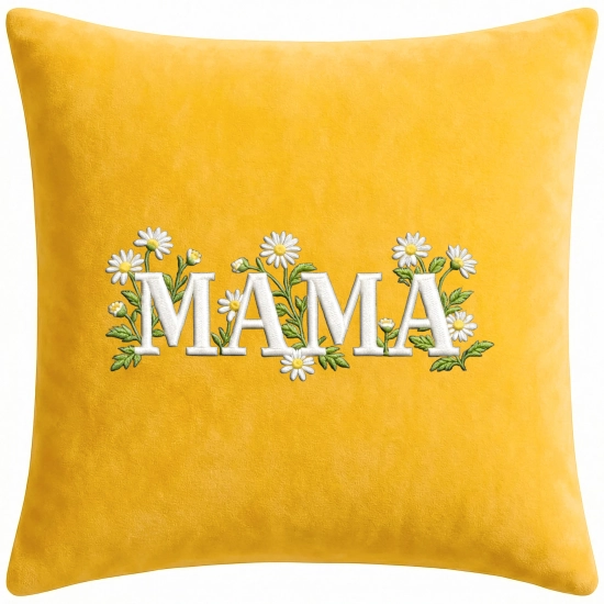 Miodowo-żółta poduszka welurowa 40x40 z eleganckim, białym haftem MAMA w otoczeniu polnych stokrotek i zielonych liści.