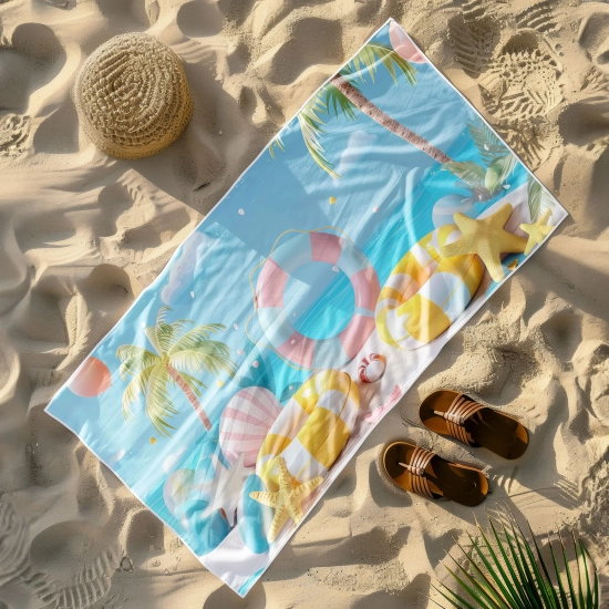 Szybkoschnący ręcznik plażowy z pastelowymi kołami i rozgwiazdami płasko na piasku - TwójDomNa5.pl