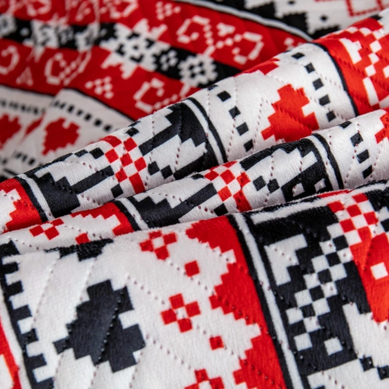 Zbliżenie na pikowaną jodełkę i mięsistą tkaninę velvet z certyfikatem OEKO-TEX®